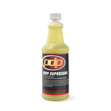 Bottle of M89 Supersuds car wash soap with a white cap on a white background